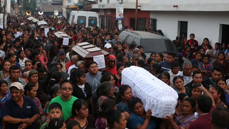 Mourners take part in the funeral of seven victims who died during the eruption of the Fuego volcano in Alotenango, Guatemala on June 4th, 2018. Photograph:  REUTERS/Jose Cabezas