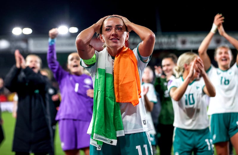 Katie McCabe celebrates after Ireland sealed promotion to Nations League A in Belgium on Tuesday night. Photograph: Ryan Byrne/Inpho