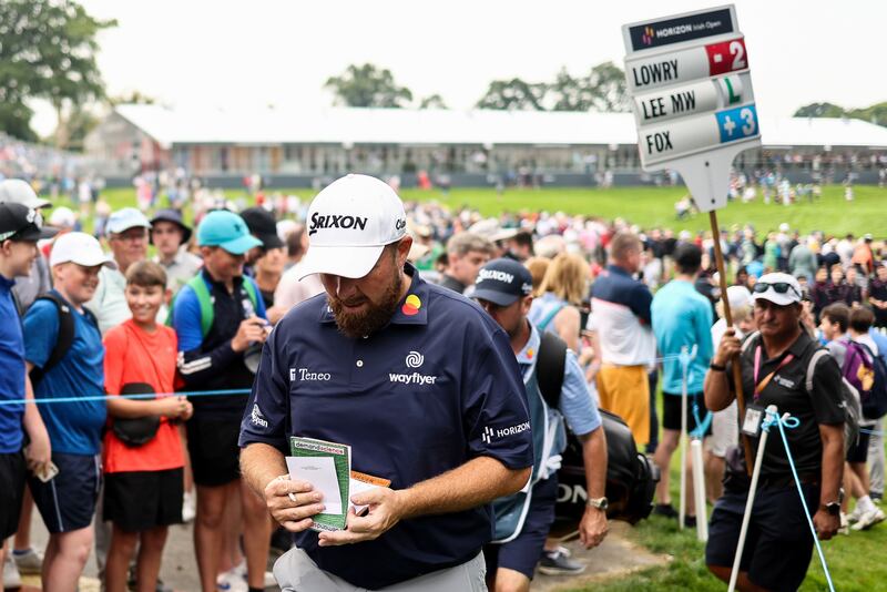 Shane Lowry checks his yardage book. Photograph: Ben Brady/Inpho