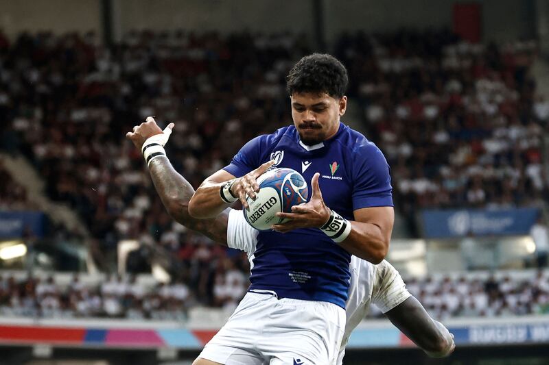 Samoa's lock Theo McFarland  claims a lineout during his side's clash with England. Photograph: Sameer Al-Doumy / AFP via Getty Images
