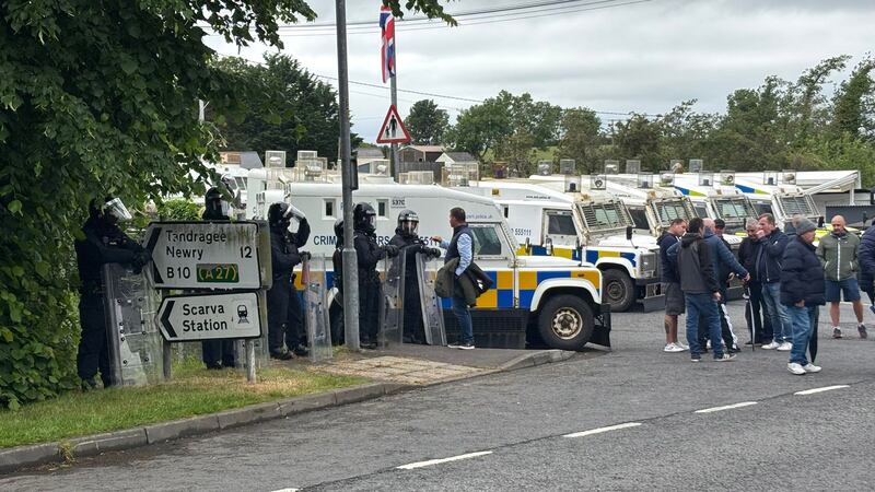 A large number of armoured vans with riot police separate counter-protesters from the pro-Palestinian march at Scarva, Co Down. Photograph: Niall Carson/PA Wire