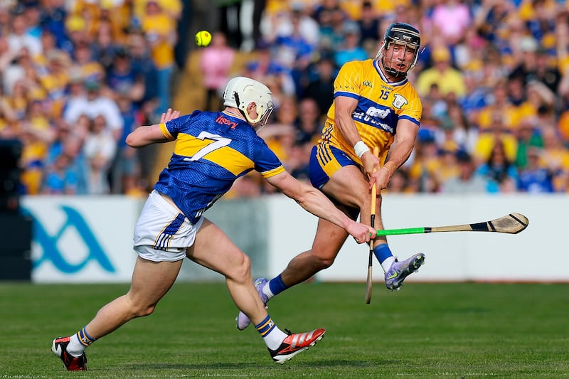 David Reidy of Clare in action against Bryan O’Mara of Tipperary. Photograph: Natasha Barton/Inpho