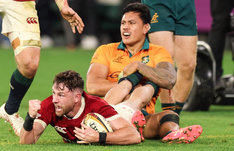 Hugo Keenan celebrates scoring the Lions' fifth try against the Wallabies in the second Test at Melbourne. Photograph: Tom Maher/INPHO