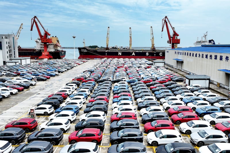 Chinese-made cars are seen before being loaded onto a ship at the port in Lianyungang, in China's eastern Jiangsu province. Photograph: STR/AFP via Getty Images