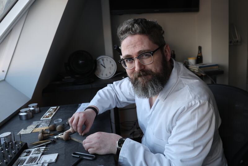 Goldsmith and engraver David Mulreany at work in the engraving section of Weir & Sons. Photograph: Bryan O’Brien