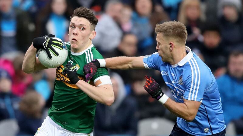 Kerry’s  David Clifford takes on Jonny Cooper. Photograph: Inpho/Bryan Keane