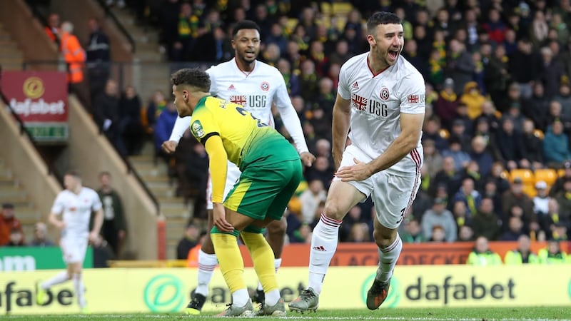 Enda Stevens celebrates scoring  Sheffield United’s first goal during the Premier League match against  Norwich City. Photograph:  Naomi Baker/Getty Images