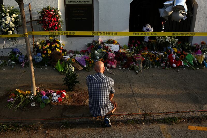 A makeshift memorial outside the Emanuel African Methodist Episcopal Church, where a shooting took place. Photograph: Travis Dove/The New York Times