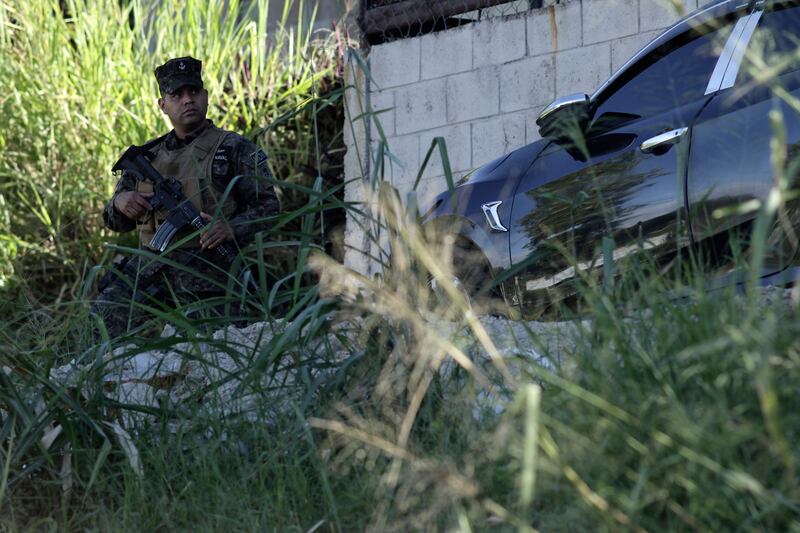 A soldier takes part in an operation in search of gang members in Soyapango. Photograph: Salvador Melendez/PA