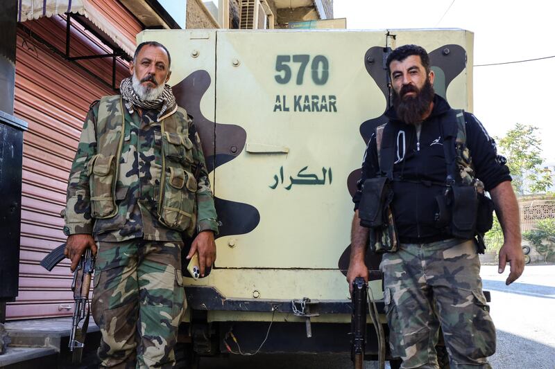 Syrian Druze fighters after Syrian government forces pulled out of the southern Sweida governorate last month. Photograph: Shadi Al-Dubaisi/AFP via Getty Images         