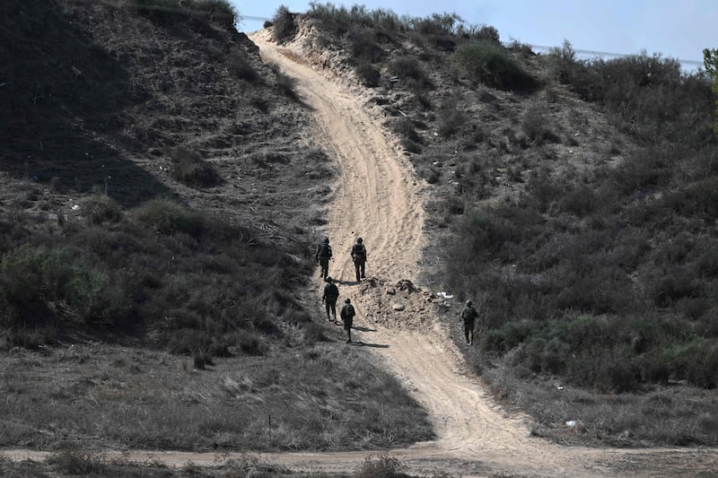 Israeli soldiers patrolling close to the Gaza Strip border. Photograph: ARIS MESSINIS/AFP via Getty Images