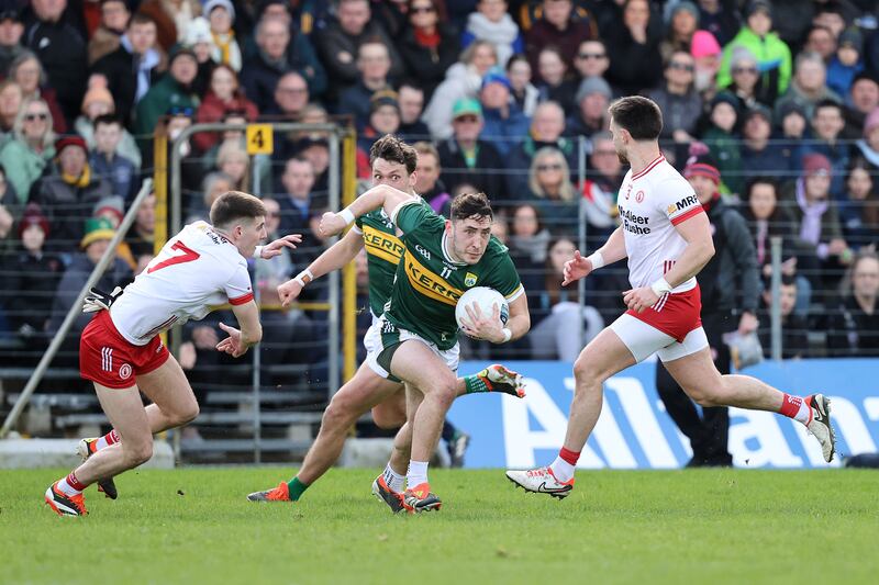Tyrone's Niall Devlin and Paudie Clifford of Kerry. Photograph: Bryan Keane/Inpho