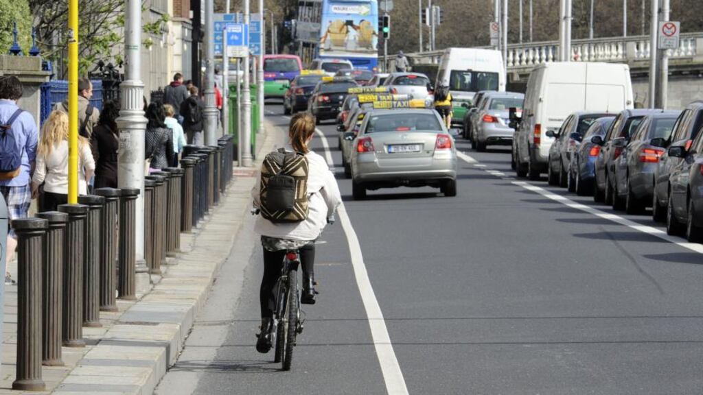 Traffic on Dublin's quays, one of the locations where dangerous levels of pollution were found. (Photograph: Dave Meehan)