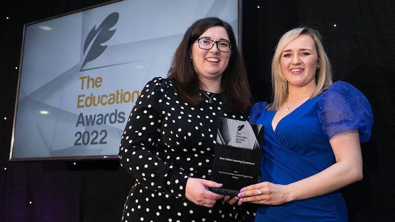Laure Hayes and Amie Turner, Flúirse, received the Best Online Learning Experience Award trophy.