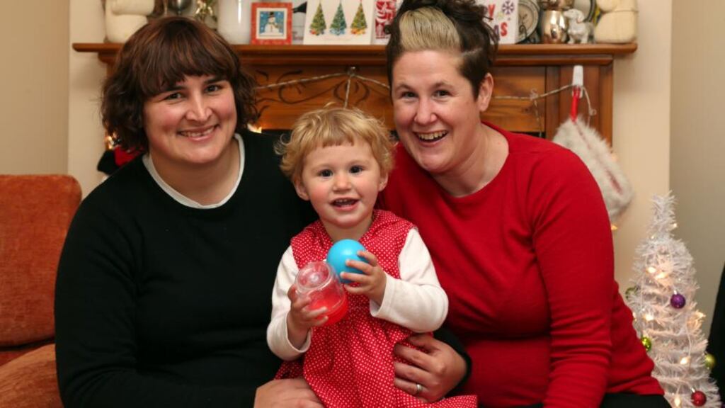Charlotte McCallum Mallard (right) and her wife Beth Mallard and their 22-month-old daughter Lola, at home in Galway. Photograph: Joe O’Shaughnessy