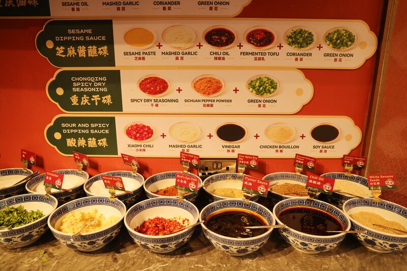A guide to making your sauce at Chongqing Hotpot. Photograph: Bryan O'Brien