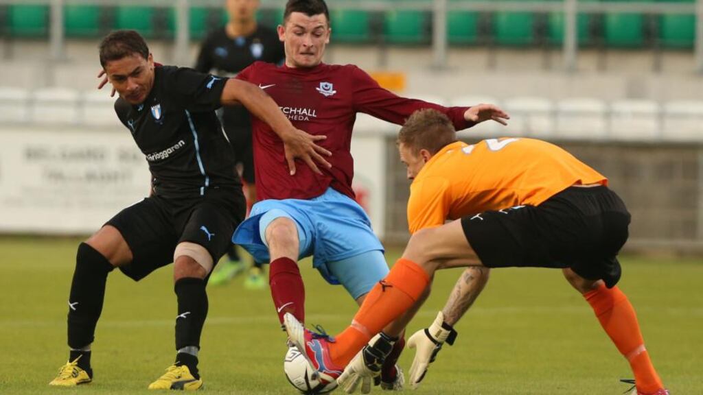 Drogheda’s Ryan Brennan (centre) goes close in the first leg at Tallaght Stadium.