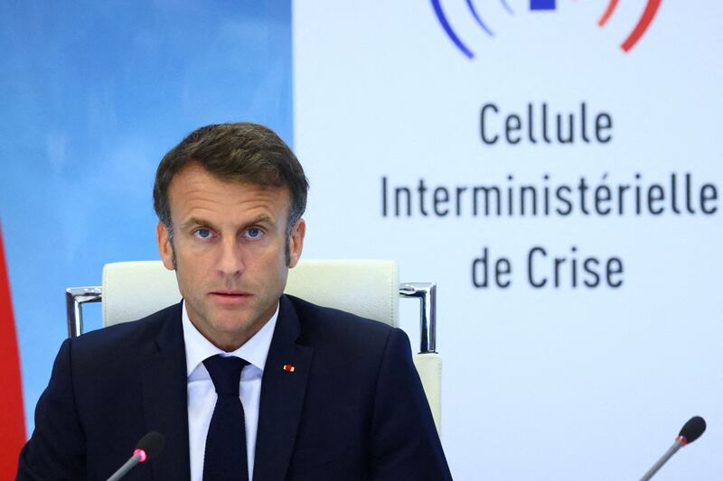 French president Emmanuel Macron addresses a crisis unit meeting after riots erupted across the country following the death of Nahel. Photograph: Yves Herman/Pool/AFP via Getty 