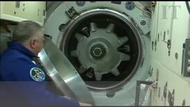 Olympic torch floats onto the International Space Station