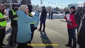 Russian police arrest man for holding up blank sheet of paper