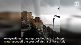 Massive waterspout looms over Italian coastal town
