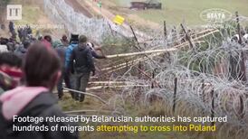 'We are going to Germany,' say migrants gathered at Polish border with Belarus