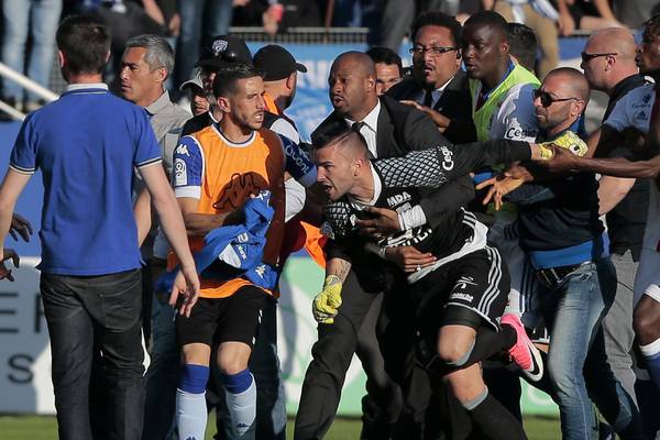 Game abandoned after Bastia fans attack Lyon players