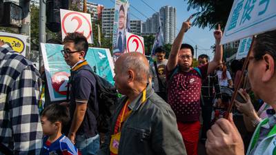 Record numbers vote in Hong Kong amid angry calls for democracy