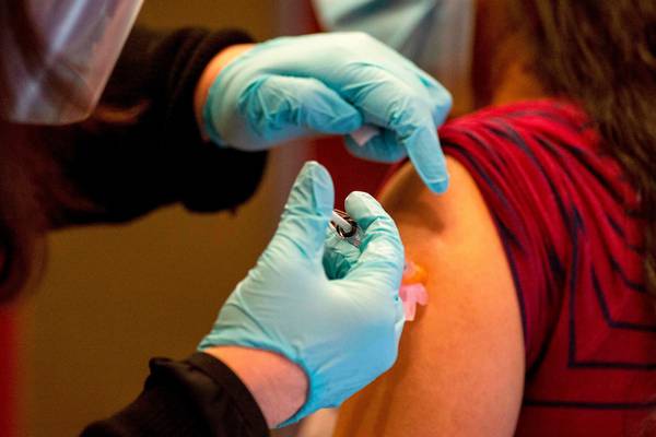 Covid vaccine brings some muted festive cheer