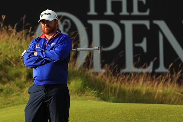 JB Holmes leads after opening exam at Portrush