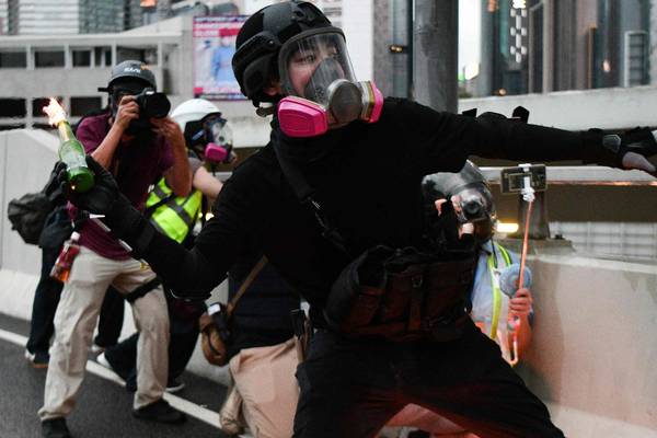 Hong Kong police fire teargas and water cannon at protesters