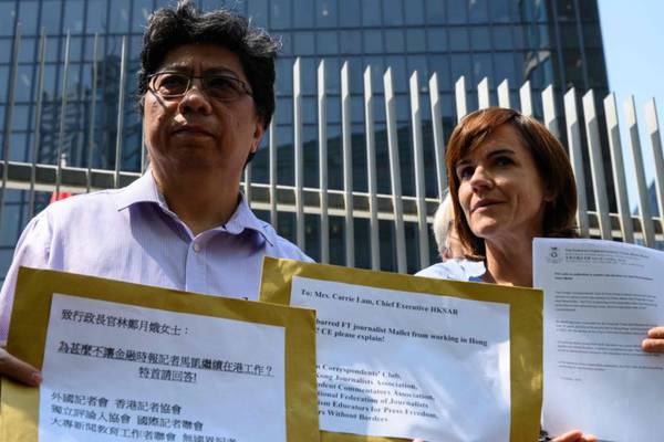 Journalist visa refusal seen as body blow for Hong Kong press freedom