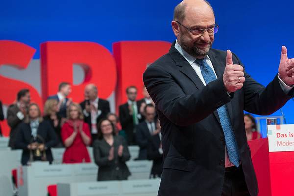 Schulz secures backing to enter government talks with Merkel’s CDU