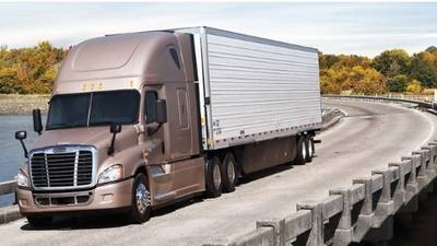 Daimler cuts profit forecast for trucks after poor sales