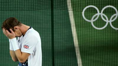 Andy Murray moved to tears after retaining Olympic title