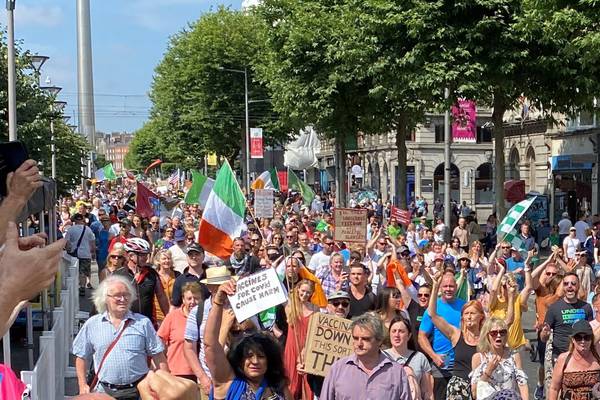 Large crowd gathers in Dublin to protest vaccine cert system