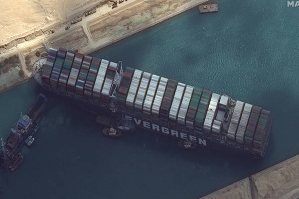 Experts fear it could take weeks to dislodge huge ship blocking Suez Canal