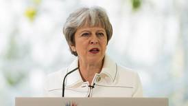 Westminster committee urges May to take more active role in North