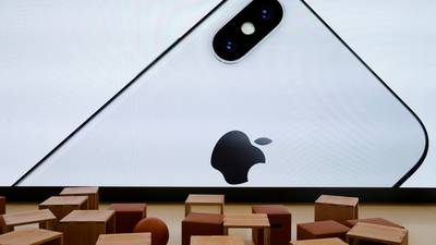 Apple beats profit expectations as it plans $100bn share buyback