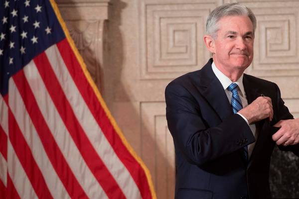 Fed lifts rates and projects four rises for 2018