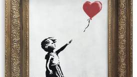 Banksy artwork shreds itself after being sold at auction