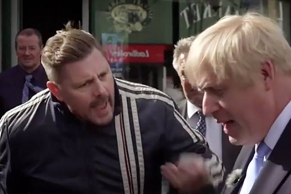 ‘You’re playing games!’ Johnson gets taste of public anger from man with Irish accent