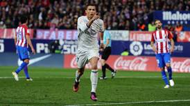 Cristiano Ronaldo’s derby hat-trick puts Real Madrid four points clear