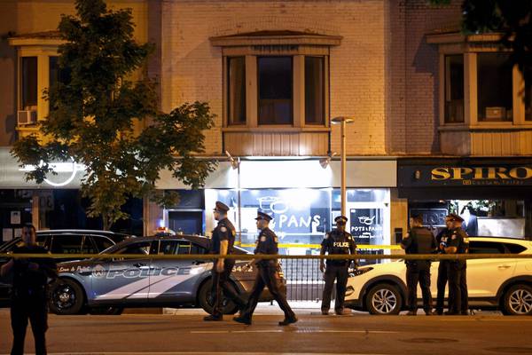Woman and child killed and 13 injured in Toronto gun attack