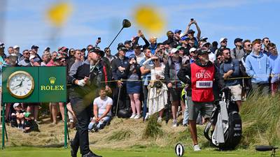 Brian Harman makes light of the elements to take five-shot lead at the Open