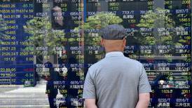 Asian shares wilt, take cue from Wall Street