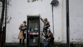Banksy linked to street art about government surveillance