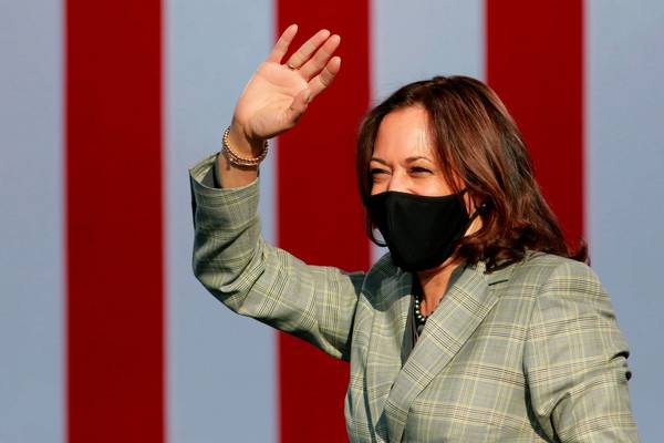 Kamala Harris suspends in-person events after aide tests positive for Covid-19