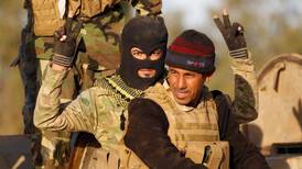 Iraqi forces push into Tikrit from north and south