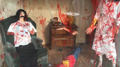 Cafe owner told to tone down Halloween display